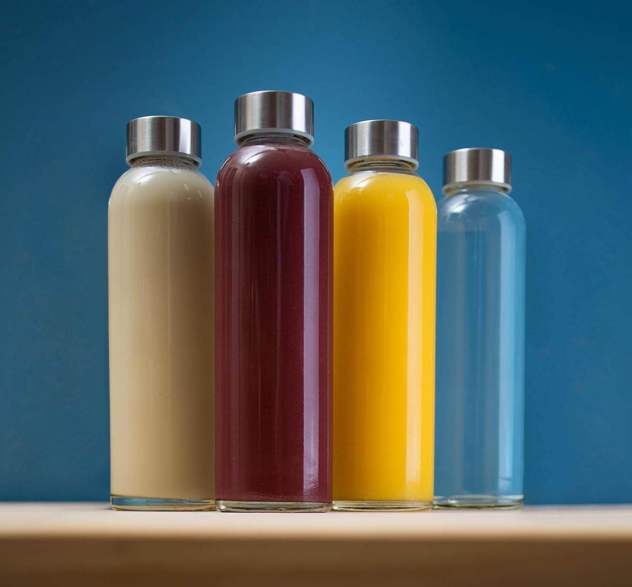 Epica 18-Oz Glass Water Bottles with Lids, Juice Bottles - BPA Free & Eco-Friendly Reusable Refillable Bottles for Juicing, Set of 4 - Clear