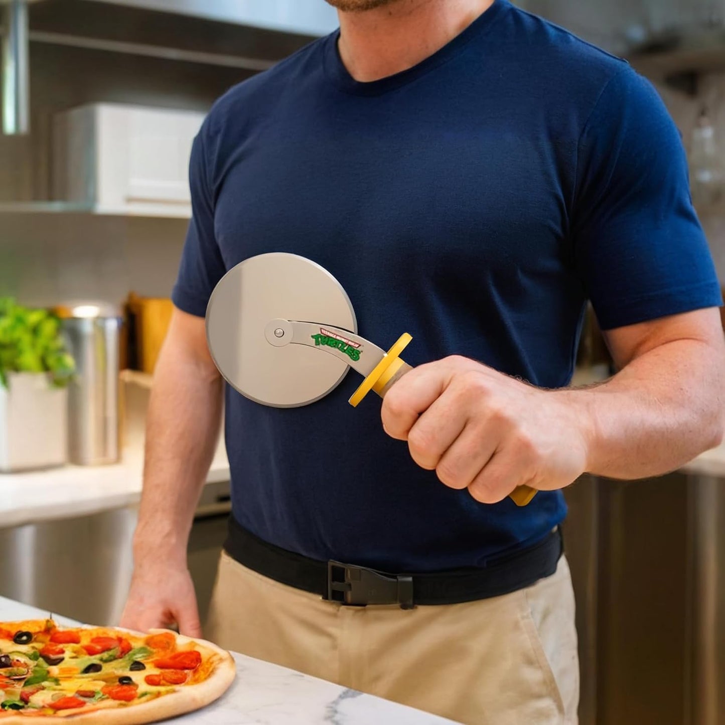 Teenage Mutant Ninja Turtle Pizza Cutter - TMNT Ninja Turtles Sword Pizza Slicer - Stainless Steel Wheel with Ergonomic Grip Handle - Thumb Guard Protection - Fun Kitchen Tool for Pizza Lovers